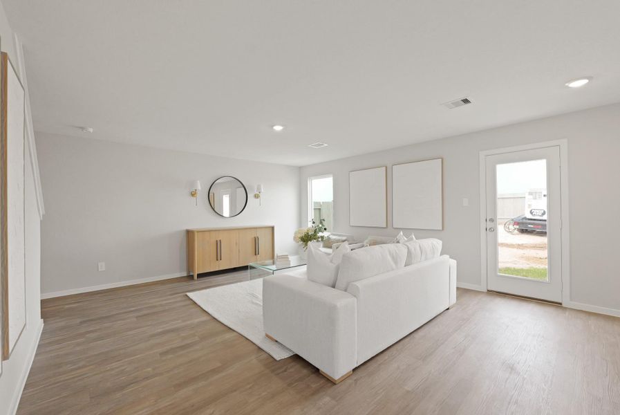 Furnished interior view inside a new home in Sunterra, Katy (Image 5).