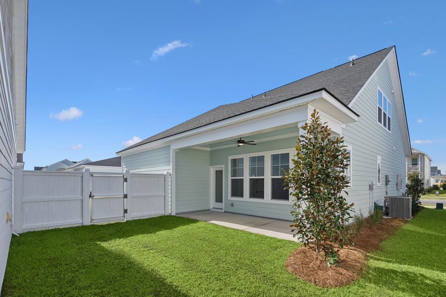 Exterior details and patio area of a home in Nexton – Midtown – The Garden Collection, Summerville (Image 4). Exterior details and patio area of a home in Nexton – Midtown – The Garden Collection, Summerville (Image 4).