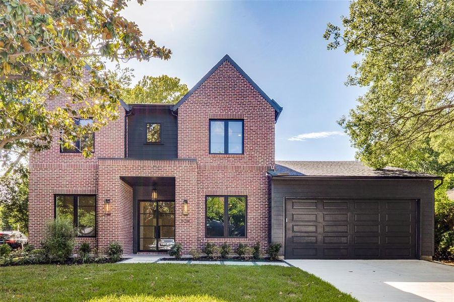 Modern brick facade with dark trim accents Modern brick facade with dark trim accents