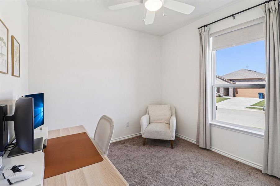 Carpeted office featuring baseboards Carpeted office featuring baseboards