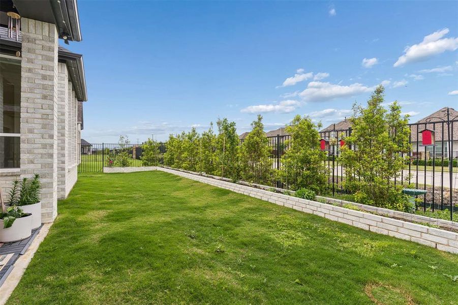 Exterior details and patio area of a home in , Rockwall (Image 27).