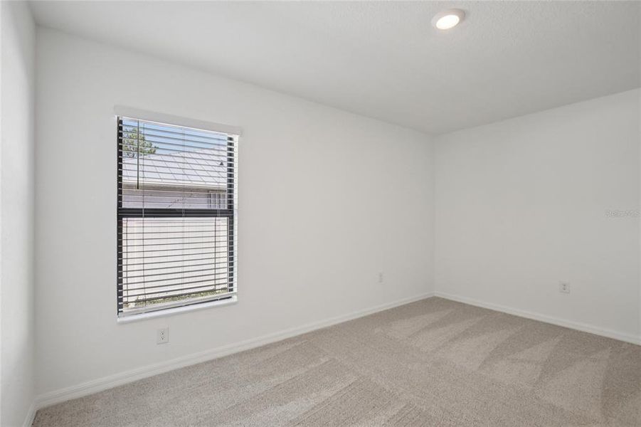 Spacious, unfurnished interior of a new home in , Port Charlotte (Image 19).