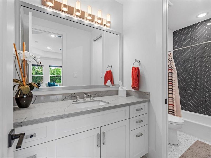 A beautiful sink and vanity area in one of the marvelous secondary baths.