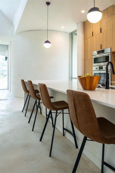 Dining room featuring concrete floors Dining room featuring concrete floors