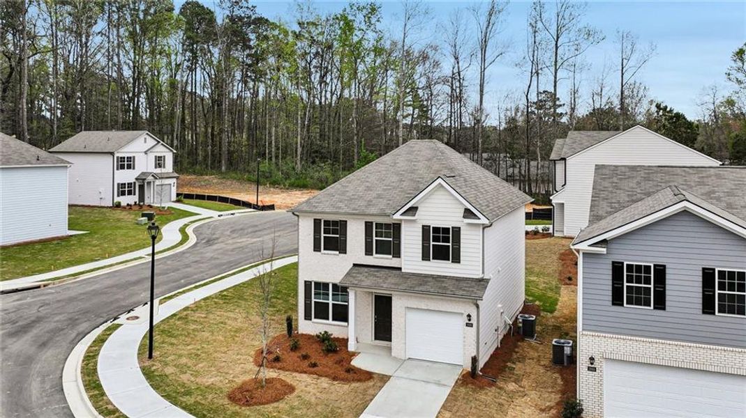 Front exterior of a new home in Sherwood Manor, College Park, GA, highlighting curb appeal (Image 21).