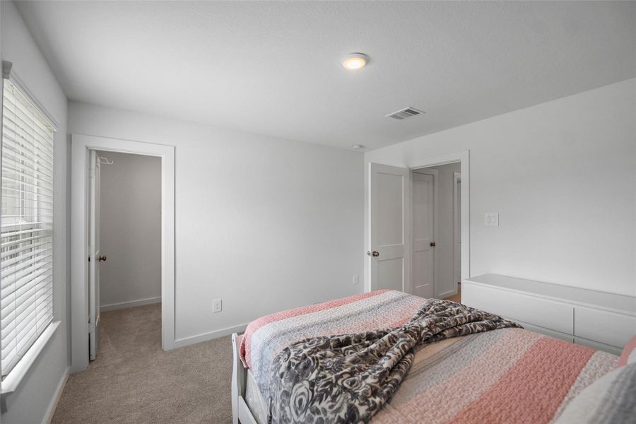 Furnished interior view inside a new home in Sorella, Tomball (Image 13).