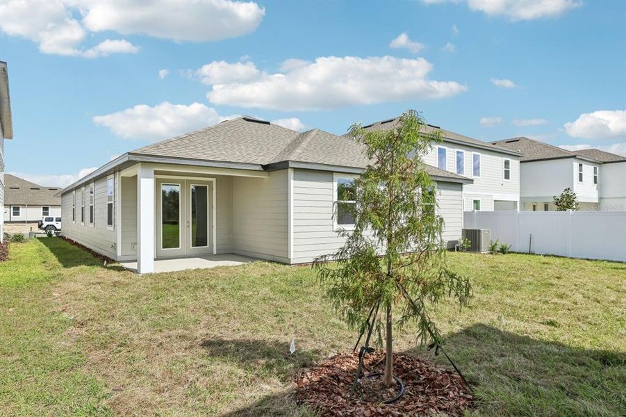 Exterior details and patio area of a home in Trailside, Mount Dora (Image 14).
