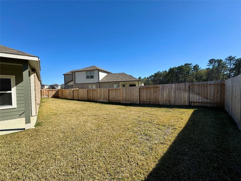 Spacious, well-maintained lawn offers endless possibilities, with ample space for a pool and additional outdoor features. Spacious, well-maintained lawn offers endless possibilities, with ample space for a pool and additional outdoor features.