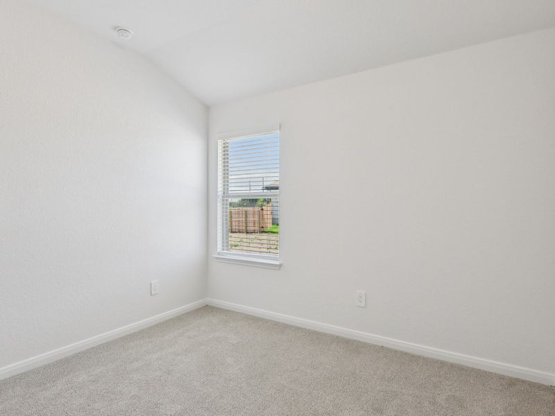 Guest bedroom in the Allen floorplan at a Meritage Homes community. Guest bedroom in the Allen floorplan at a Meritage Homes community.