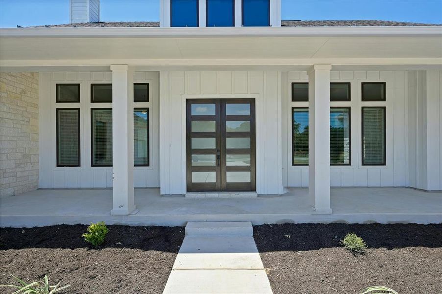 Plenty of room to put Rocking chairs or any kind of chair to sit and relax and enjoy the beauty that surrounds this house.