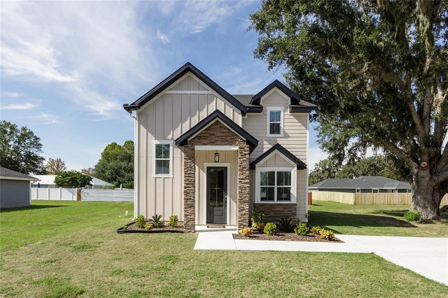 Front exterior of a new home in , Brooker, FL, highlighting curb appeal (Image 26). Front exterior of a new home in , Brooker, FL, highlighting curb appeal (Image 26).