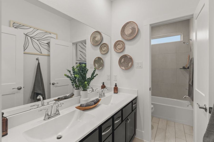 Representative furnished interior of a home built from the Rosewood by Chesmar Homes in Balmoral, Humble (Image 12).