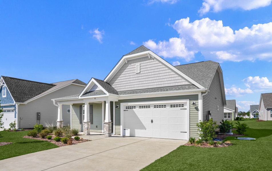 Front exterior of a new home in Coastal Club of the Carolinas, Calabash, NC, highlighting curb appeal (Image 13).