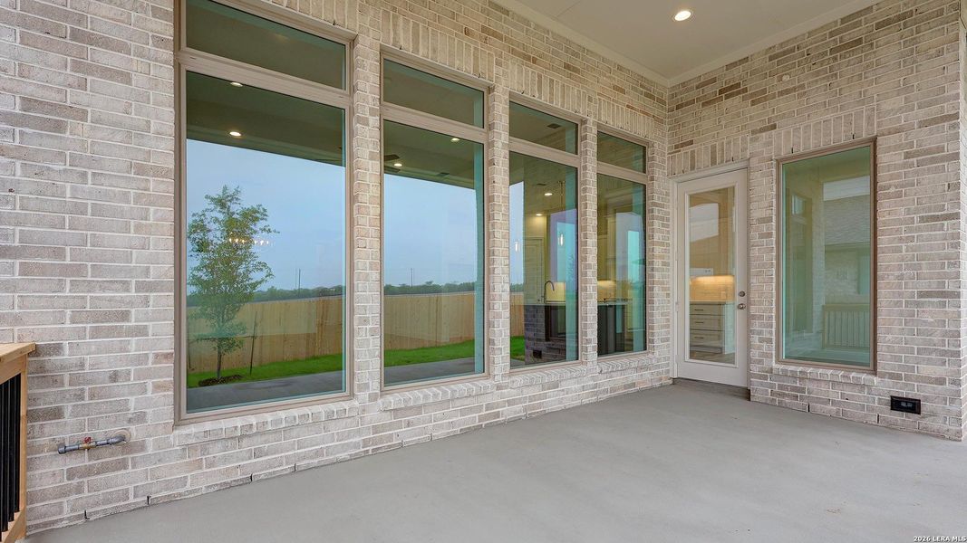 Exterior details and patio area of a home in Kallison Ranch, San Antonio (Image 18).