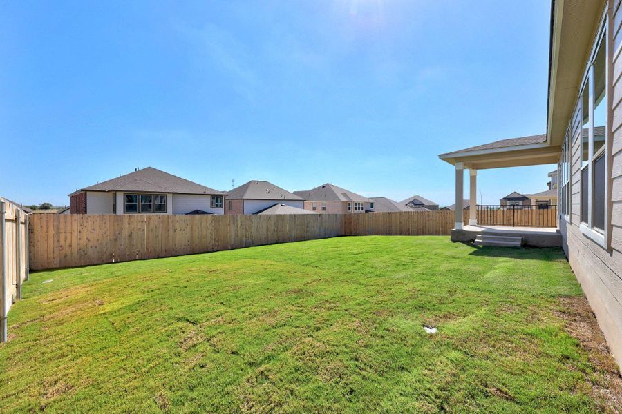 Exterior details and patio area of a home in Salerno - Classic Collection, Round Rock (Image 3).