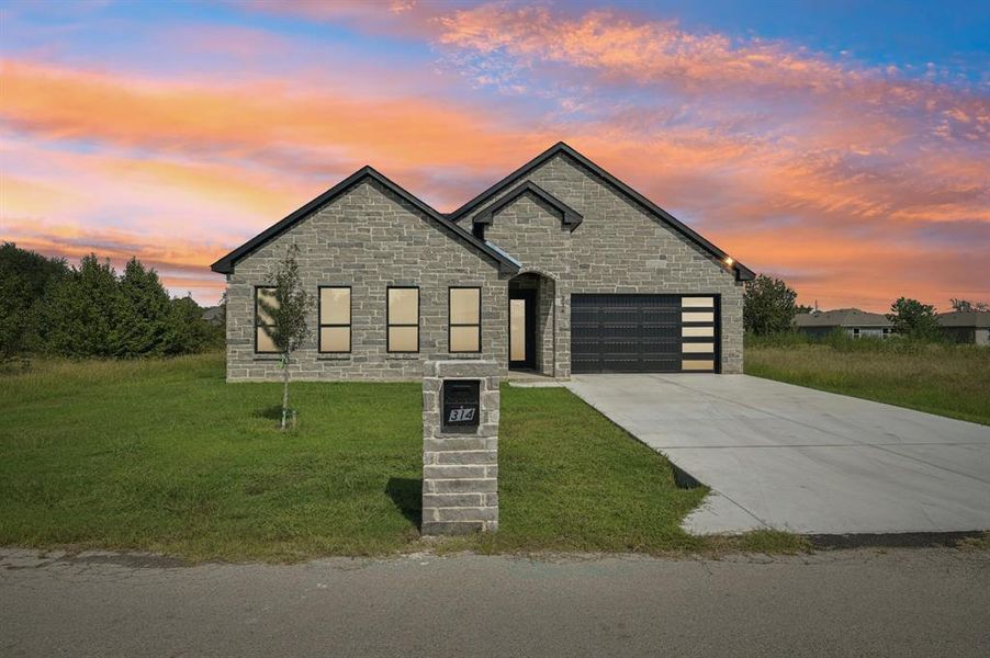 Front exterior of a new home in , Gun Barrel City, TX, highlighting curb appeal (Image 20). Front exterior of a new home in , Gun Barrel City, TX, highlighting curb appeal (Image 20).