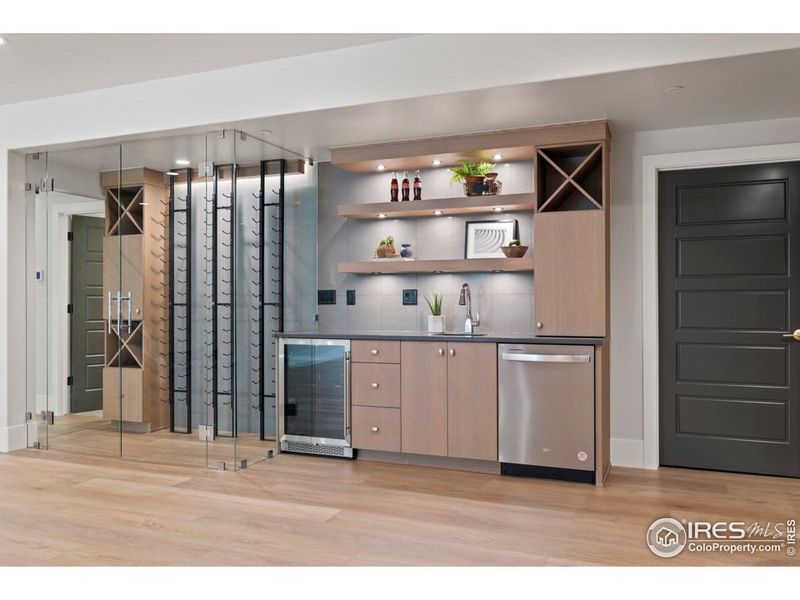 Glass enclosed wine storage, wet bar