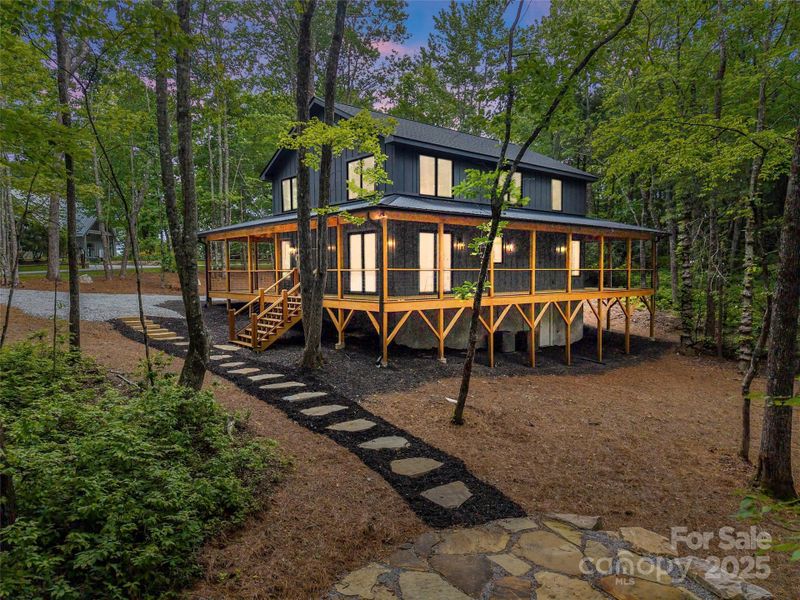 Front exterior of a new home in , Lake Toxaway, NC, highlighting curb appeal (Image 24). Front exterior of a new home in , Lake Toxaway, NC, highlighting curb appeal (Image 24).