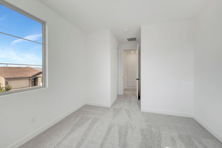 Spacious, unfurnished interior of a new home in Soleo, San Tan Valley (Image 24).