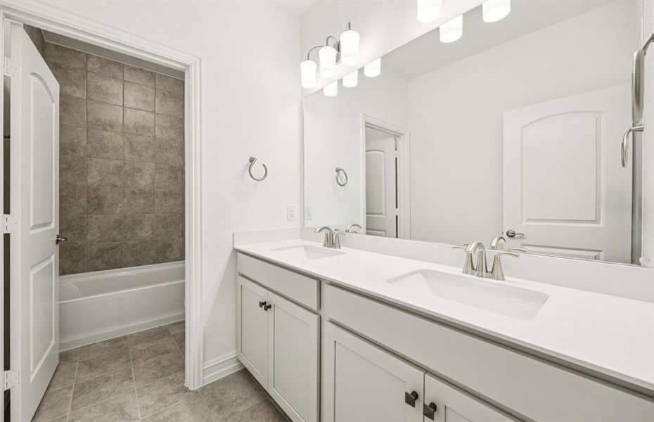 Upgraded secondary bath with elegant finishes *Real home pictured Upgraded secondary bath with elegant finishes *Real home pictured