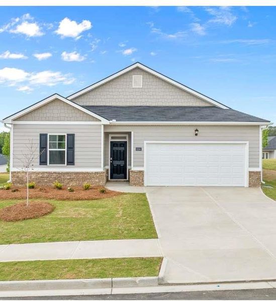 Front exterior of a new home in Champion's Run, Lithonia, GA, highlighting curb appeal (Image 2).