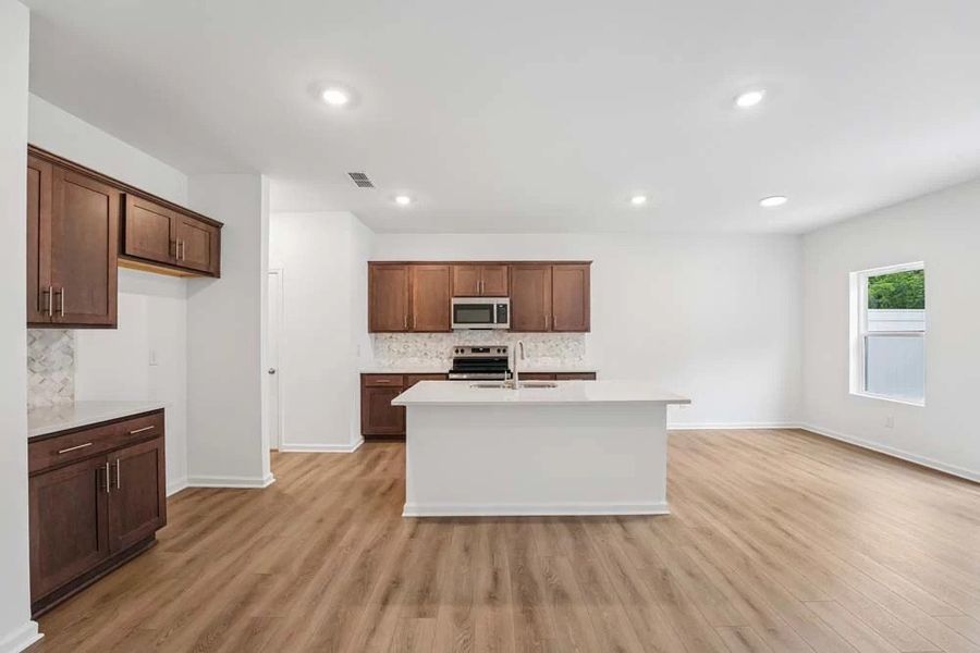 Kitchen Featuring Roosevelt Collection Finishes