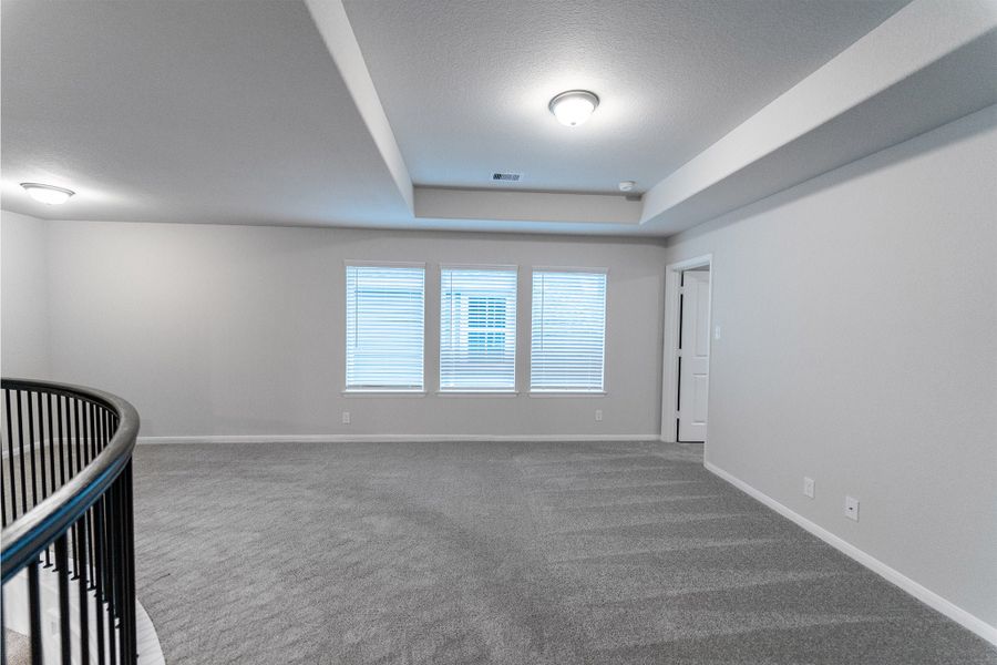 Spacious, unfurnished interior of a new home in Creekhaven, Iowa Colony (Image 21).