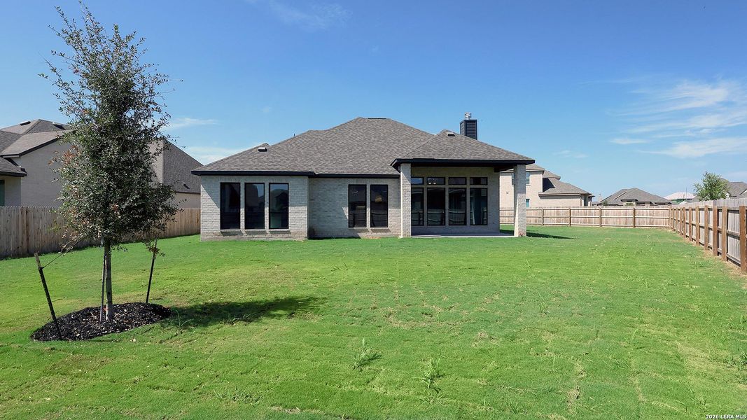 Exterior details and patio area of a home in Alsatian Oaks, Castroville (Image 3).