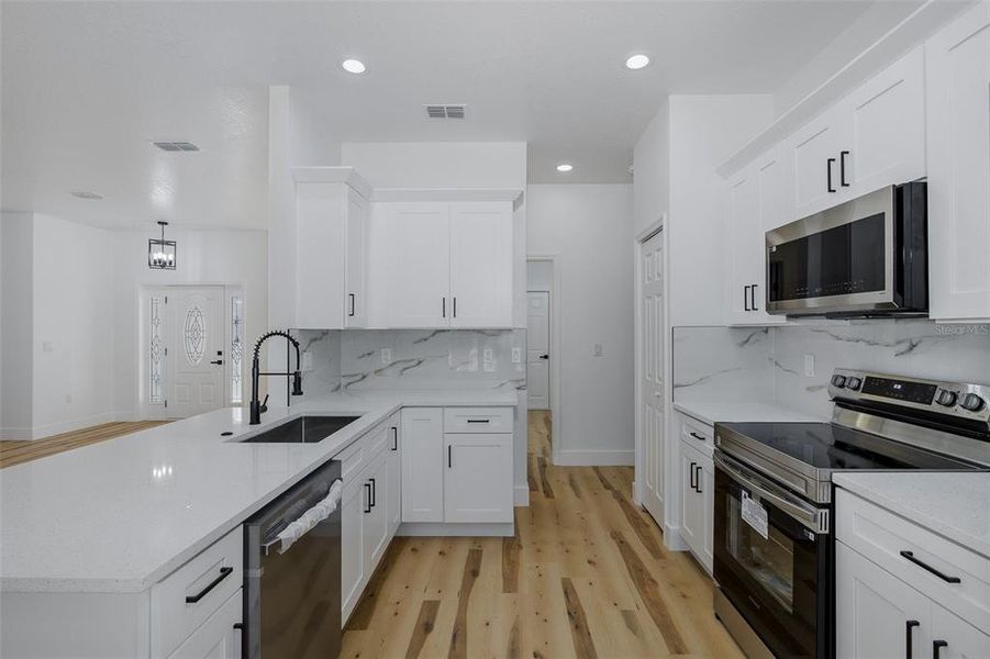 Furnished interior view inside a new home in , Weeki Wachee (Image 8).