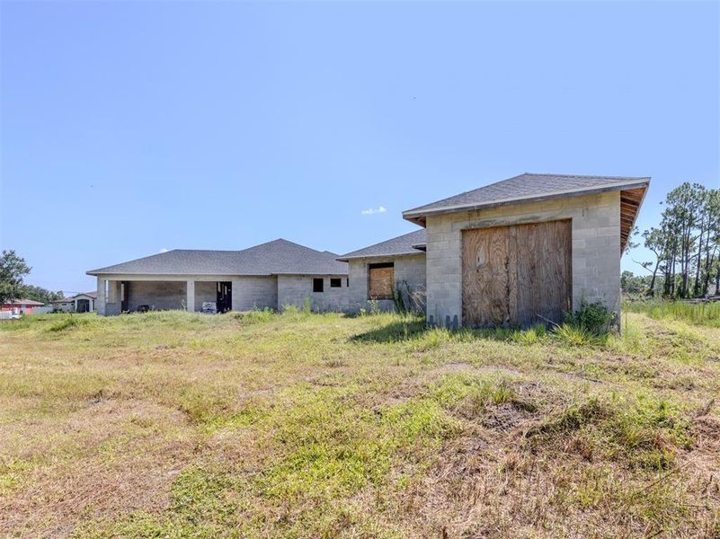 Front exterior of a new home in , North Port, FL, highlighting curb appeal (Image 12).