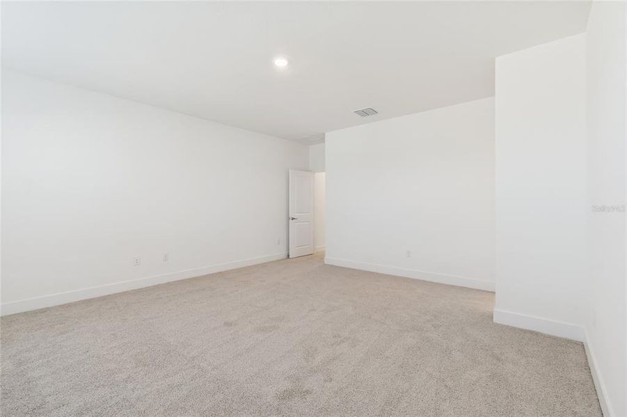 Spacious, unfurnished interior of a new home in North River Ranch – Townhomes, Parrish (Image 29).