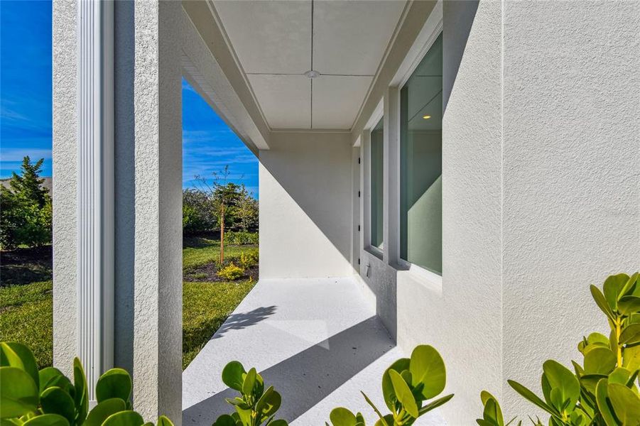 Exterior details and patio area of a home in Vistera of Venice – Garden Series, Nokomis (Image 1). Exterior details and patio area of a home in Vistera of Venice – Garden Series, Nokomis (Image 1).