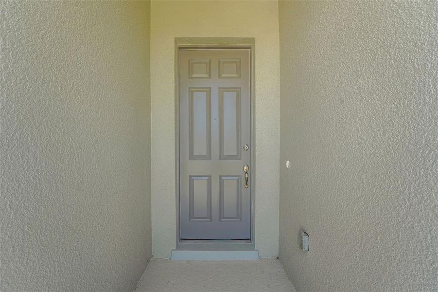 Exterior details and patio area of a home in Willowbrook North, Winter Haven (Image 22).
