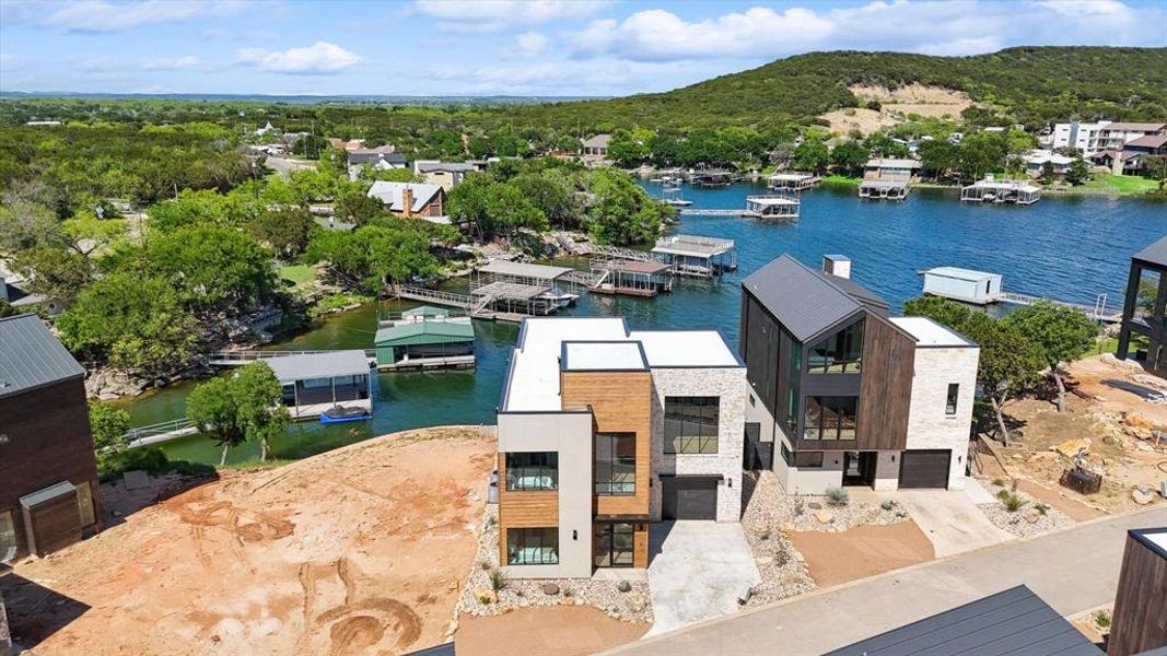 Front exterior of a new home in , Graford, TX, highlighting curb appeal (Image 21).