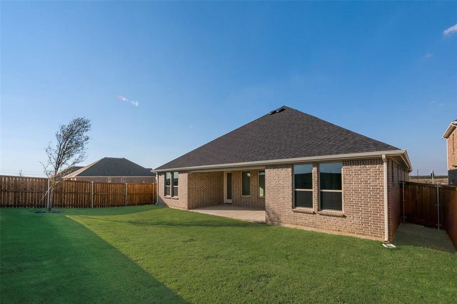 Exterior details and patio area of a home in Arbors at Legacy Hills, Celina (Image 20). Exterior details and patio area of a home in Arbors at Legacy Hills, Celina (Image 20).