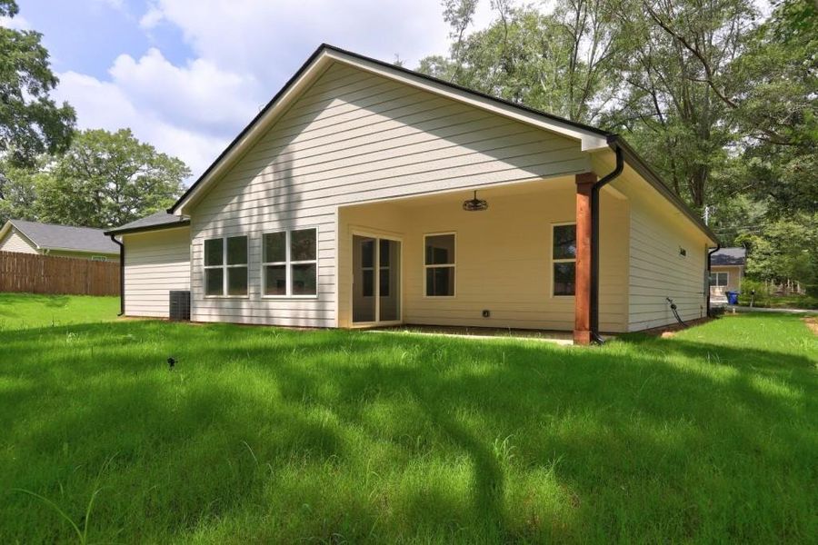 Front exterior of a new home in , Monroe, GA, highlighting curb appeal (Image 21).