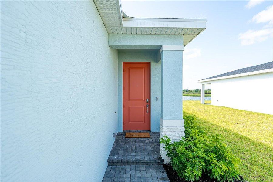 Front exterior of a new home in , Fort Pierce, FL, highlighting curb appeal (Image 18). Front exterior of a new home in , Fort Pierce, FL, highlighting curb appeal (Image 18).