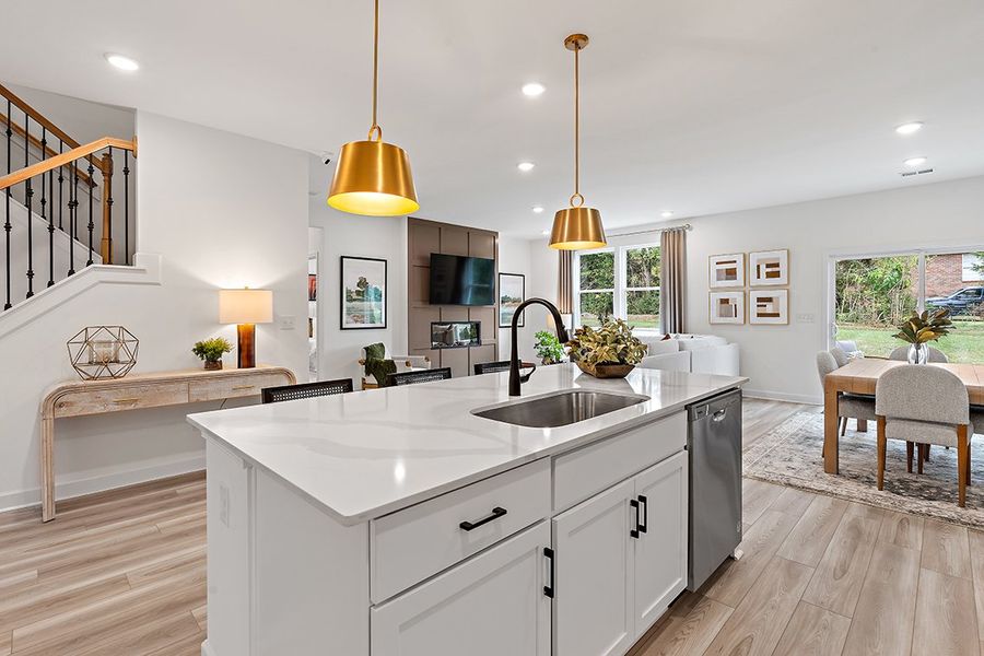 A kitchen with a large island. A kitchen with a large island.