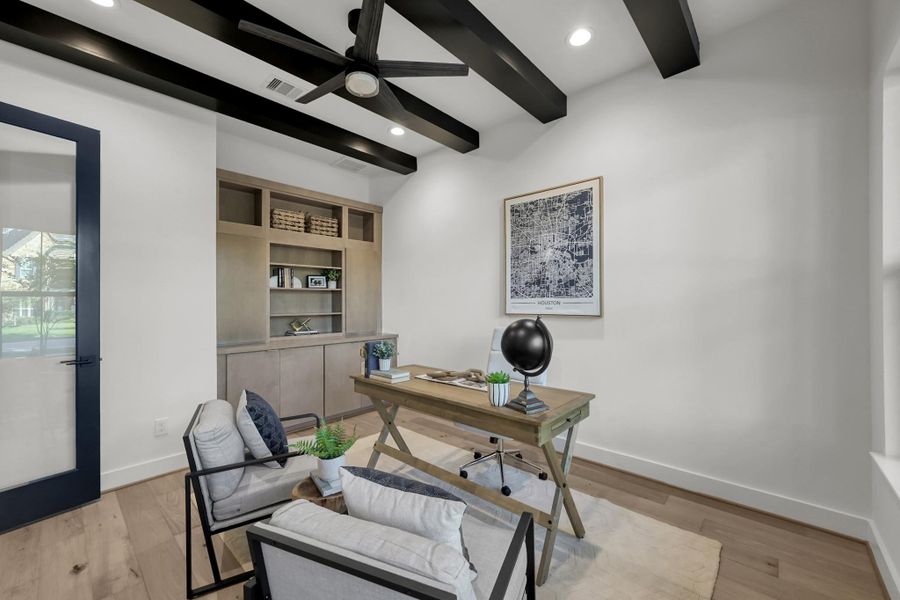 Additional view of the study featuring elegant ceiling beams and neutral finishes. Additional view of the study featuring elegant ceiling beams and neutral finishes.