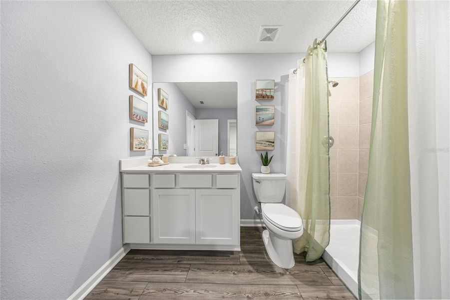 Furnished interior view inside a new home in Tara Forest East, Alachua (Image 9).