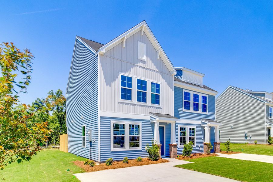 Front exterior of a new home in Padgett Commons, Hopkins, SC, highlighting curb appeal (Image 20).