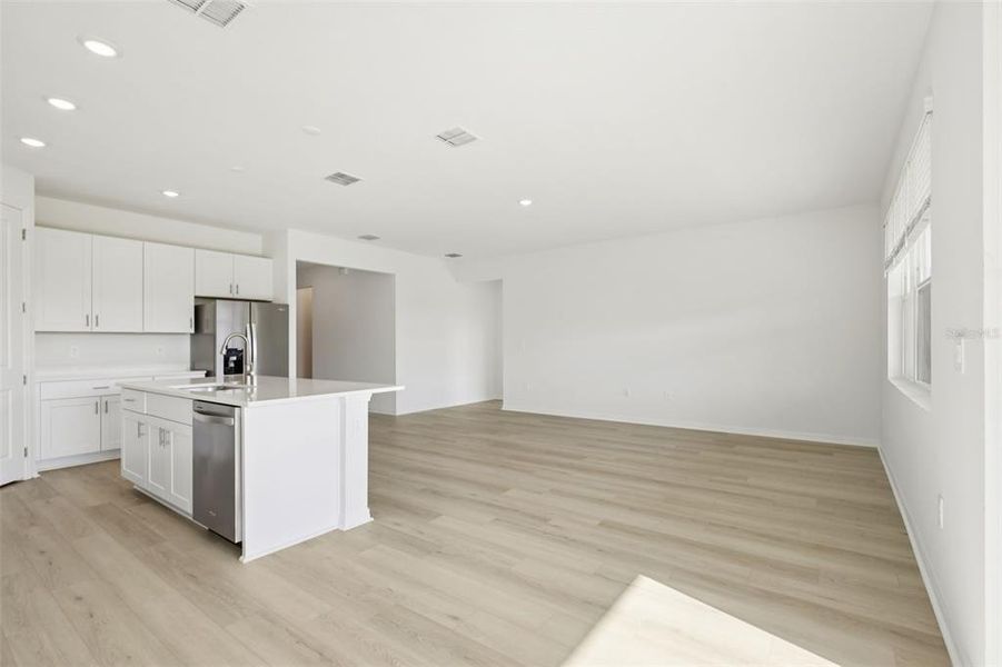 Spacious, unfurnished interior of a new home in Coasterra - Reserve Series, Palmetto (Image 34).