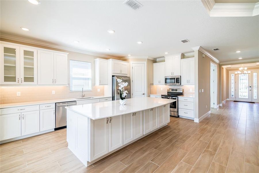 Furnished interior view inside a new home in Esplanade at Wiregrass Ranch, Wesley Chapel (Image 11).