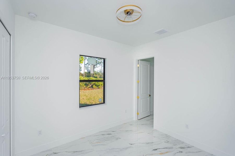 Spacious, unfurnished interior of a new home in , Lehigh Acres (Image 13).