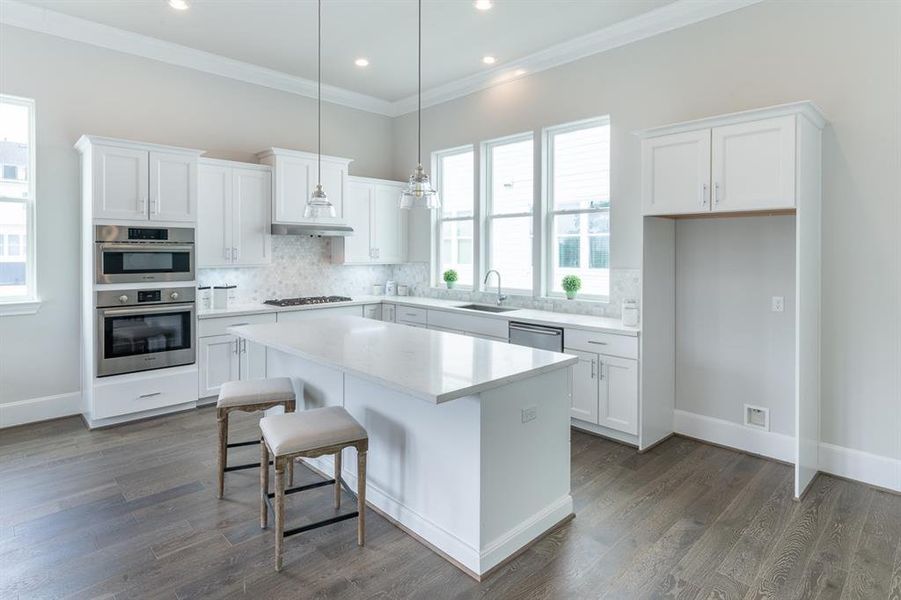 Large island style kitchen.