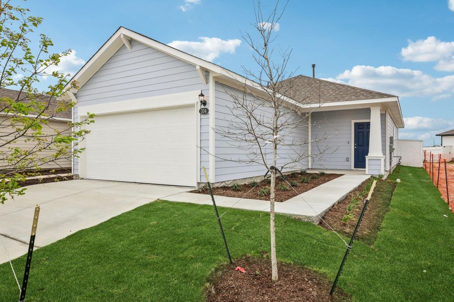 Front exterior of a new home in Harvest Ridge, Elgin, TX, highlighting curb appeal (Image 18).