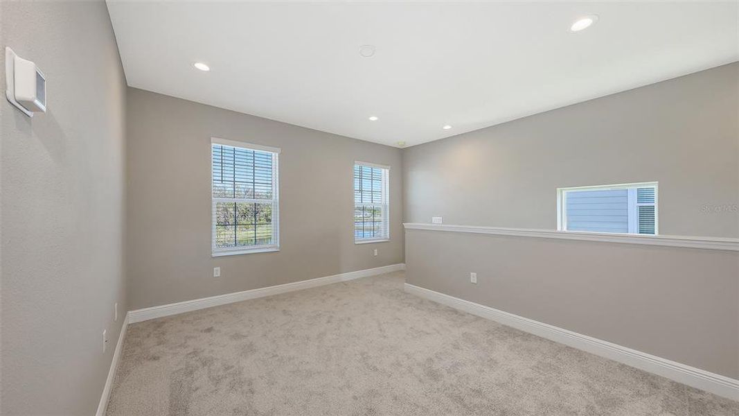 Spacious, unfurnished interior of a new home in Wildleaf, Parrish (Image 31).