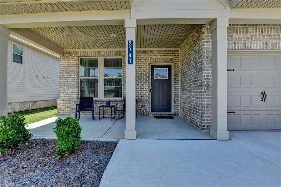 Exterior details and patio area of a home in Adagio, Dacula (Image 22).