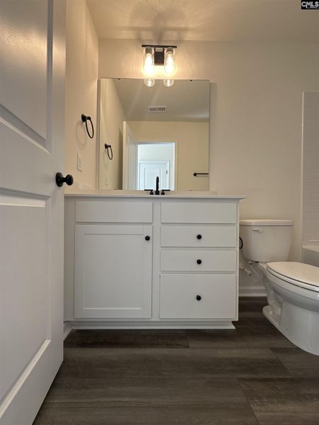 Furnished interior view inside a new home in Piney Woods Bluff, Columbia (Image 4).