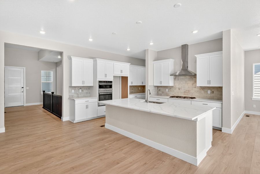 Furnished interior view inside a new home in Trailstone, Arvada (Image 14).